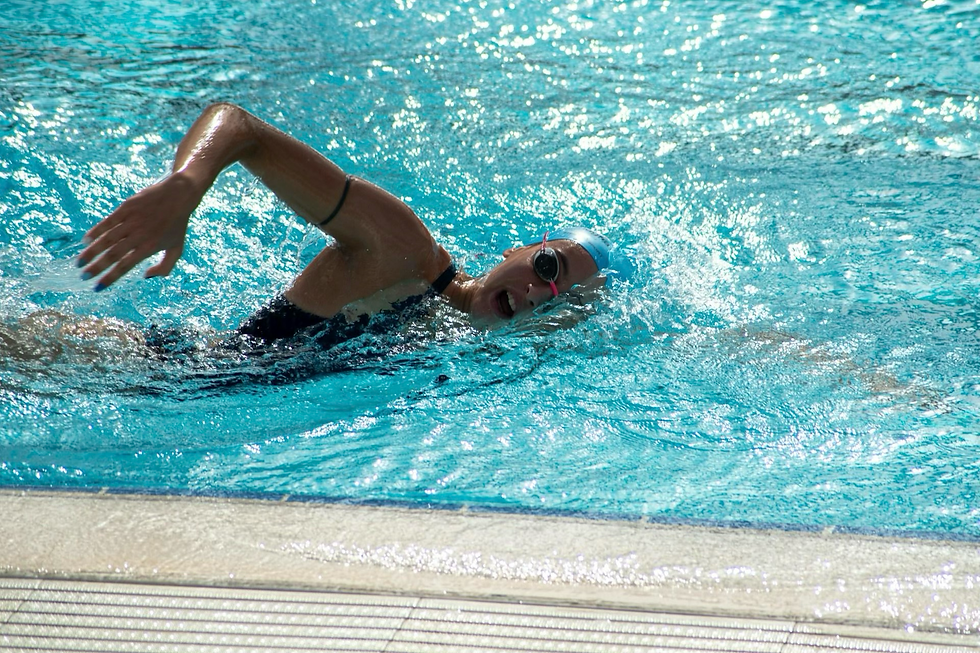 a person swimming in a pool