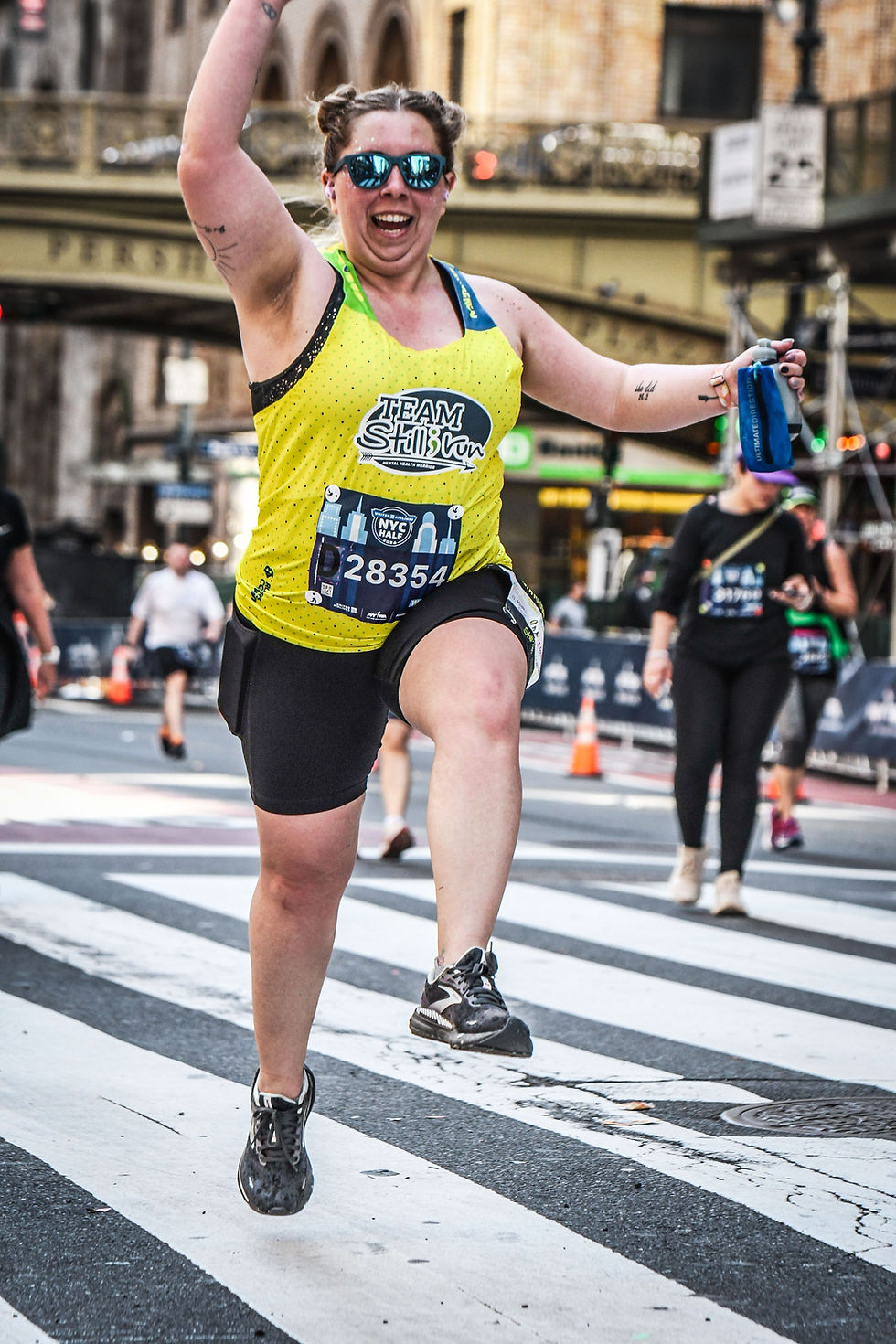 a woman running and smiling