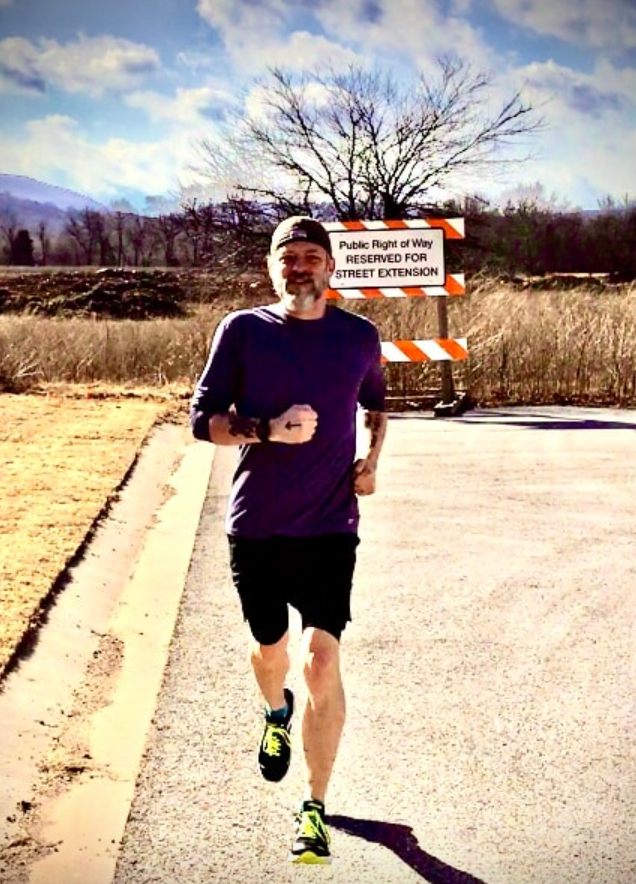 a man running on the road