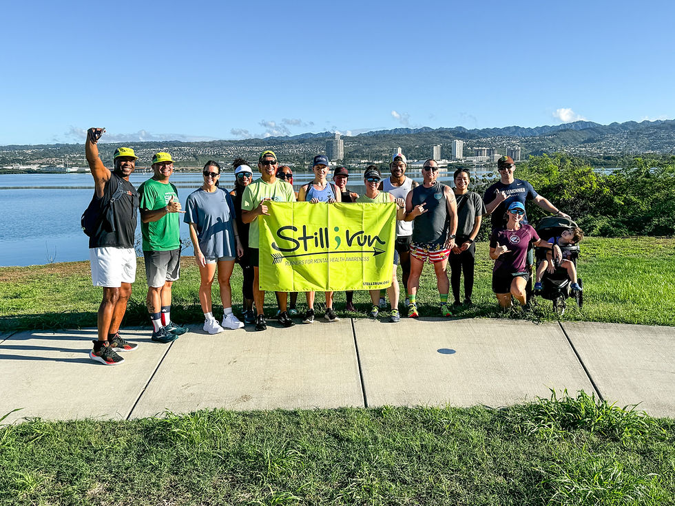 a group of people celebrating marathon running in hawaii
