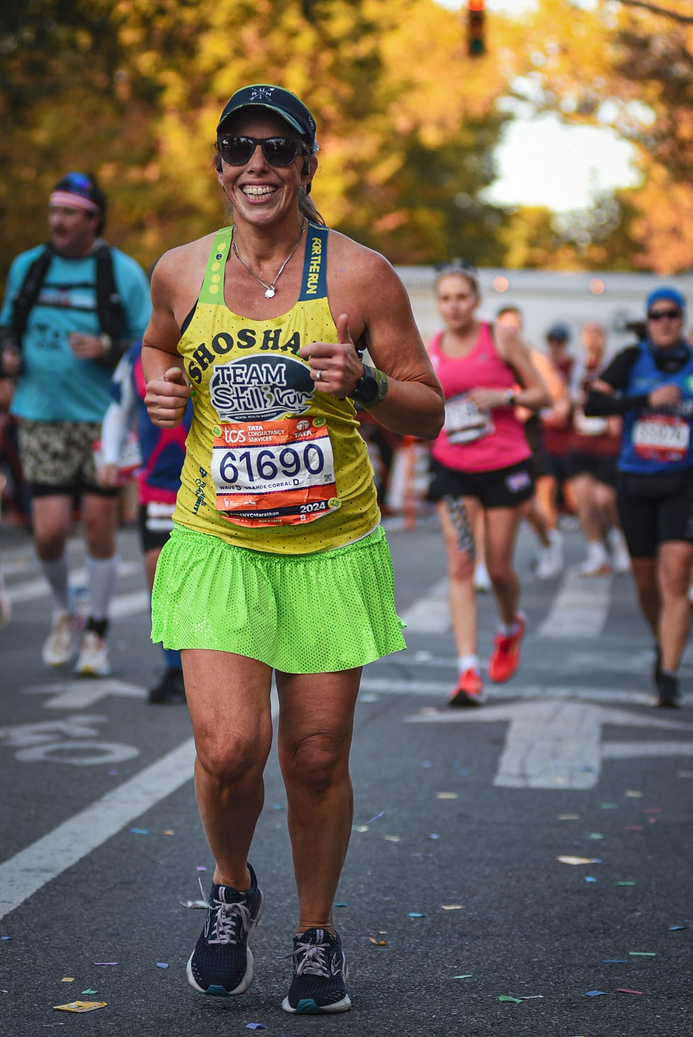 runner in a Team Still I Run singlet