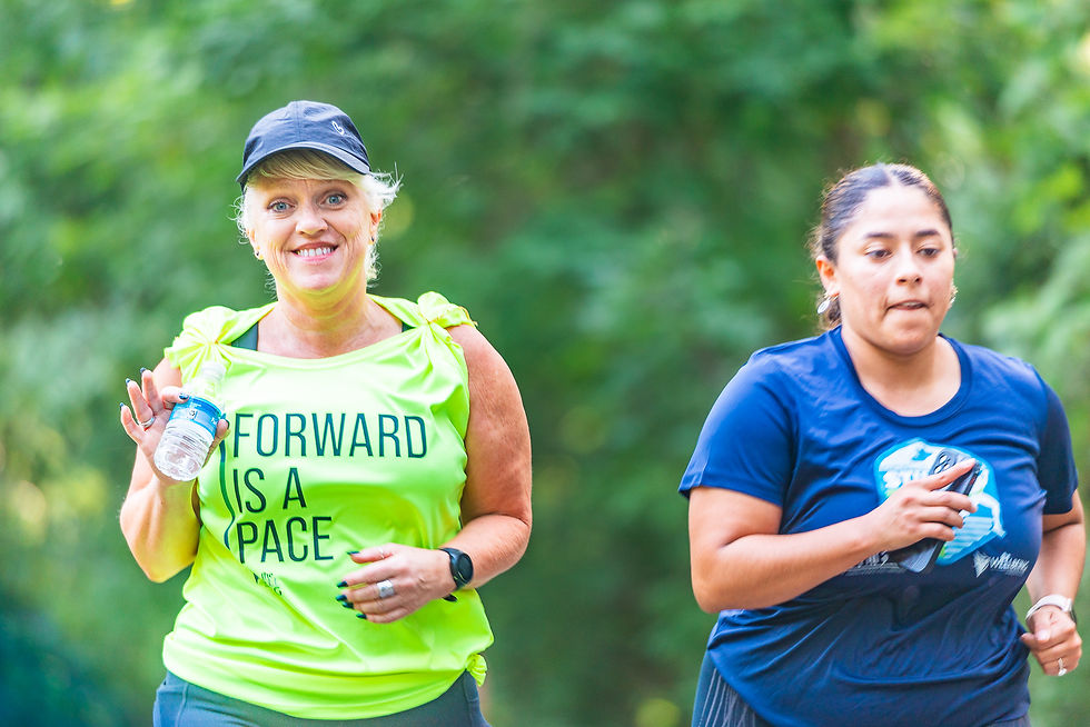 two women running