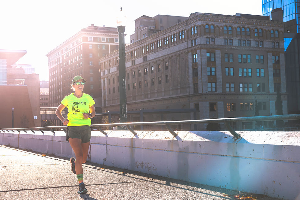 a person running across a bridge