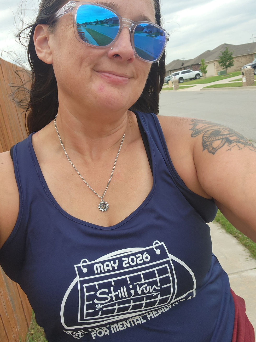 a woman wearing a Runstreak tank top