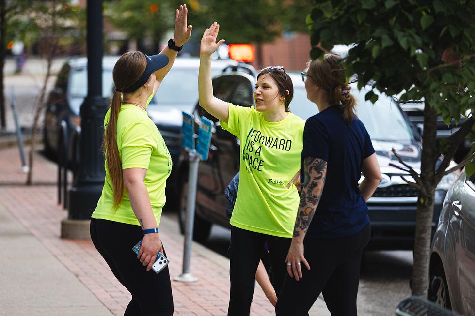 two people high fiving
