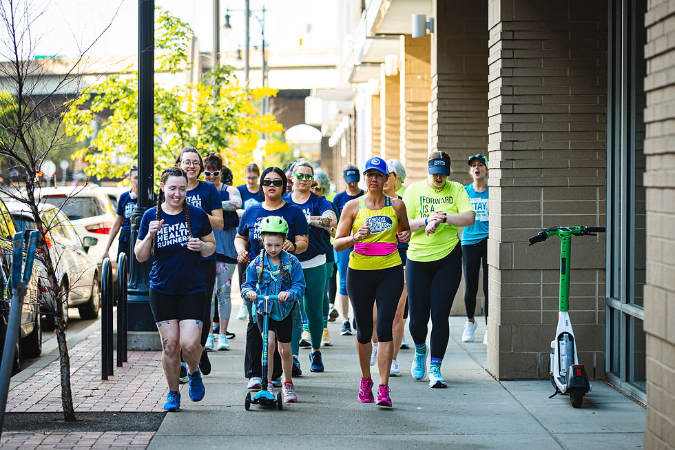people running down a street