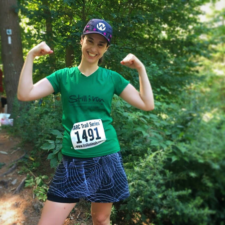 a runner showing off her biceps