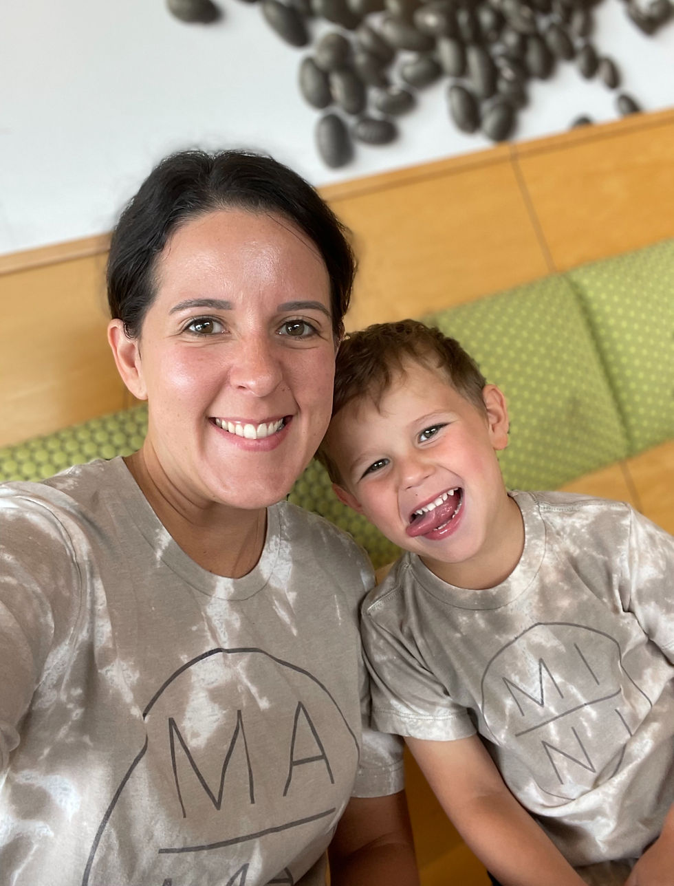 a mother and son in matching shirts